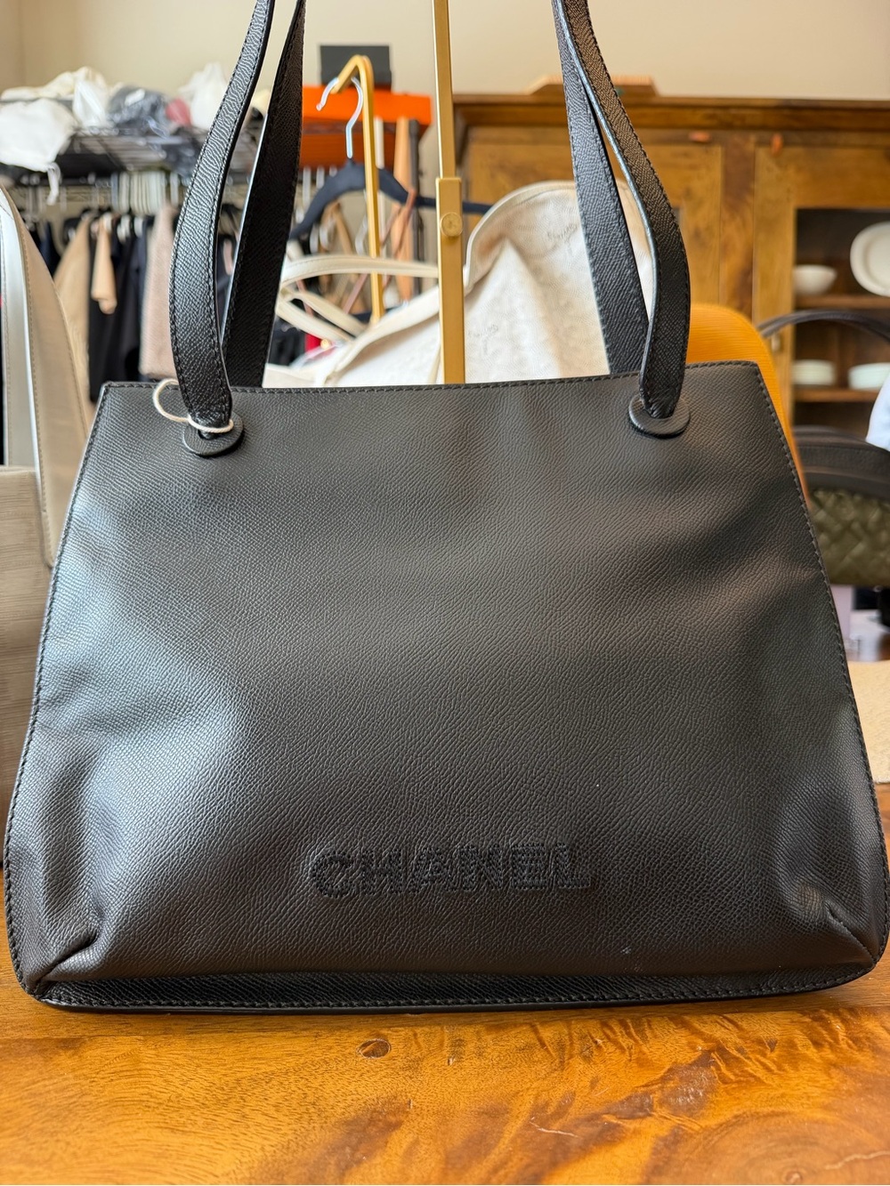 CHANEL Black Leather Tote with Embossed Logo